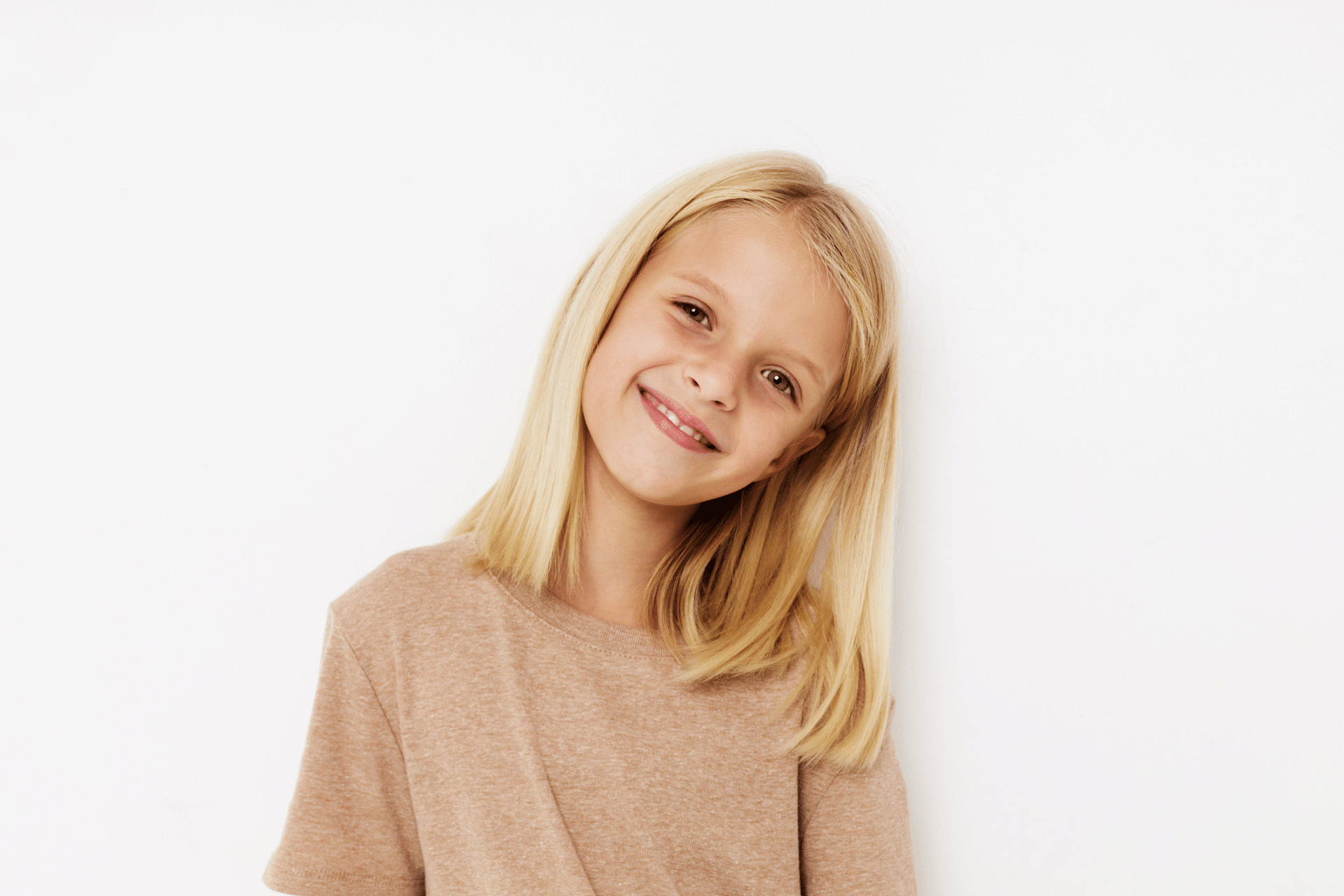 Child smiling before an early orthodontic evaluation in Roswell, GA